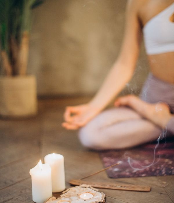 A serene woman in a yoga pose, embodying balance and calm.