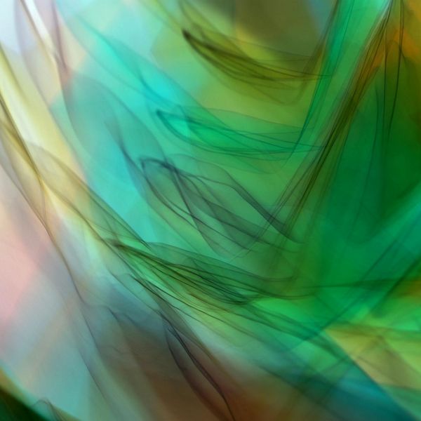 Abstract representation of flowing energy with mint green colors.